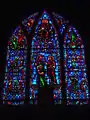 The stained glass window behind the altar inside St. Peter's Catholic Church in Brownsville, Pennsylvania