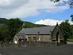 Small stone-built church in a graveyard