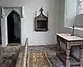 Vestry door, ambry and communion table