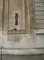Statue on wall