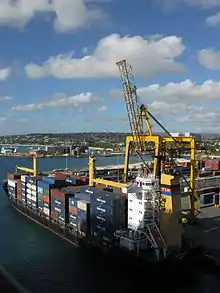 Image 2A container ship docked in the deep water harbour of Bridgetown, Barbados, which opened in 1961. (from History of the Caribbean)