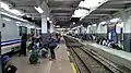 The south platform of the station filled with Greater Bandung Local Train passengers