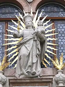 A statue of Our Lady of Victory (1654), shown with crescent moon and solar rays, portal of Schlägl monastery church