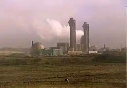 Domed factories with two large chmineys