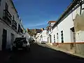 Street leading up to the castle in the village of Santa Olalla del Cala