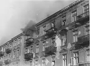NARA copy #39Bandits jump to escape captureMen preparing to commit suicide by jumping off the upper floors of 23 and 25 Niska Street.  22 April 1943