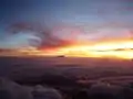 The sunrise on Mount Kilimanjaro which is 70 kilometres (43 mi) from the summit of Mount Meru.