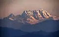 Mount Mankial, which rises to 18,600 feet (5,700&nbsp;m)