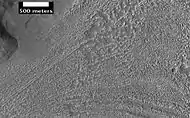 Complex surface around mound in Deuteronilus Mensae, as seen by HiRISE, under the HiWish program.  Location of this image is in the black box labeled B in the previous image.