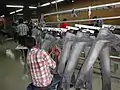 Tacking on jeans (adds strength to high-stress areas).