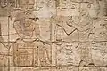 Taharqa and the gods of Gematen (the Temple of Kawa). He makes an offering to the ram-headed god Amun-Re. Kawa shrine.