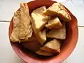 Tahu goreng (fried tofu) has its brown skin