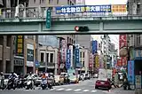 Horizontal traffic lights mounted on a footbridge in Taiyuan, China