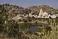 Nearby pond and the temple in background