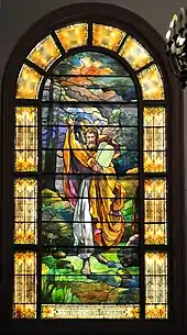 Stained glass of "Moses with the Tablets", a surviving piece of the old Temple De Hirsch, landmarked but nonetheless demolished.