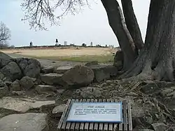 In addition to an 1896 cast iron ID marker and a plaque (depicted): General Armistead and a few Confederate soldiers charged across this wall, reached the Union cannon behind it and were soon overwhelmed