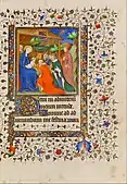 Page of a Gothic illuminated manuscript with rinceaux and foliage ornaments