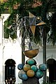 The Explorer (1999)Size: 700&nbsp;cm x 575&nbsp;cm x 350&nbsp;cmMedium: Ciment fondu, stainless steel, gold leafCollection: Singapore Art Museum.