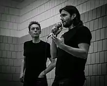 Millburn (left) and Nicodemus speaking in 2014