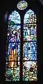 The Nativity – The glory of the first Christmas Day is celebrated in the window of the Holy Family.  The artist depict Jesus' humble birth.  This is the only gallery window that survived  the fire of 1965 which destroyed the nave.  Only one piece of glass was broken!  The circle shows the star of Bethlehem.