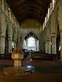 The font and nave, looking towards the chancel