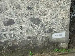 The tablet on the wall of that jail