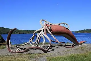 #45 (2/11/1878)A "life-sized" (55-foot) concrete and metal sculpture of the Thimble Tickle giant squid of 1878. Completed in 2001 and weighing 4 tonnes, it was designed by Don Foulds and built by him and his students, following a CA$100,000 government contribution (equivalent to US$64,568 in 2021).