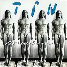 The British cover, showing four Greek Koroi statues and the name of the band