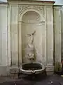 Fontaine du Dauphin, Place Paul Comte. The fountain, on the wall of the Bishop's residence, appears in the drawings of Toulon made for Louis XIV in 1668.