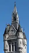 Bartizans on the West Tower of the new Town House in Aberdeen, Scotland, 1868–74.