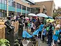 Trustees and school children rededicate Reaching Out statues by Carla Rutgers statues at Nord Anglia International School Rotterdam in the summer of 2022