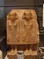 Group statue of Sehotepibreankh-Nedjem (left) and Nebpu (right)