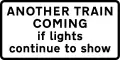 Supplementary plate at multiple track automatic level crossings warning of a second train