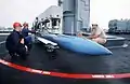 A guided missile training round being loaded into a Mark 26 launcher, USS&nbsp;Arkansas