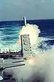 A BGM-109 Tomahawk Land-Attack Missile (TLAM) is launched toward a target in Iraq from the port side Mark 143 Armored Box Launcher (ABL) on the stern of the nuclear-powered guided missile cruiser USS Mississippi (CGN-40) during Operation Desert Storm.