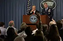 Secretary Rumsfeld responds to a reporter's question during a Pentagon press briefing. Rumsfeld and General Richard Myers, Chairman of the Joint Chiefs of Staff, gave reporters an operational update on Operation Iraqi Freedom on October 2, 2003.