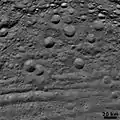 Vestan craters in various states of degradation, with troughs at bottom(6 August 2011)
