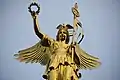 Victory with a laurel wreath (astr. symbol  or )