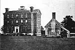 View of Rosewell, ca. 1900. The architecture of this building in the United States is said to be derived from Soulton Hall.