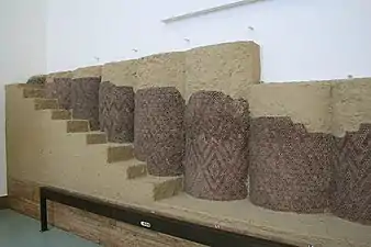 Columns with clay mosaic cones from the Eanna precinct in Uruk (southern Mesopotamia), now in the Pergamon Museum, Berlin, Germany, unknown architect, 3600-3200 BC