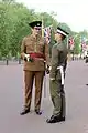 Coldstream Guards officer in No.2 dress; guardsman wears a form of No.13 dress