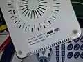 A wireless router showing printed preset security information including the Wi-Fi Protected Setup PIN.