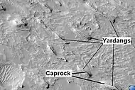 Yardangs in Medusae Fossae Formation with caprock labeled, as seen by HiRISE