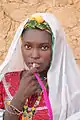 A young girl in traditional dress, Bani, 2010