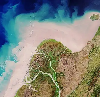 Image 6Yukon DeltaPhotograph credit: European Space Agency / Sentinel-2The Yukon Delta is a river delta formed by the Yukon River as it drains into the Bering Sea. It is part of the larger Yukon–Kuskokwim Delta, which includes the delta of the Kuskokwim River. The Yukon River rises in British Columbia, Canada, and flows through Yukon before entering the U.S. state of Alaska. This August 2017 satellite image of the Yukon Delta shows how the river branches into numerous distributary channels that meander through the low-lying terrain on their way to the sea. The sandy colour of these channels and the coastal water is indicative of the marine sediment the river carries to the sea at this time of year.More selected pictures
