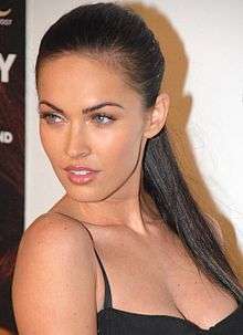 Megan Fox looking over her shoulder.